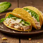 Chicken Caesar Smash Tacos served on a rustic plate