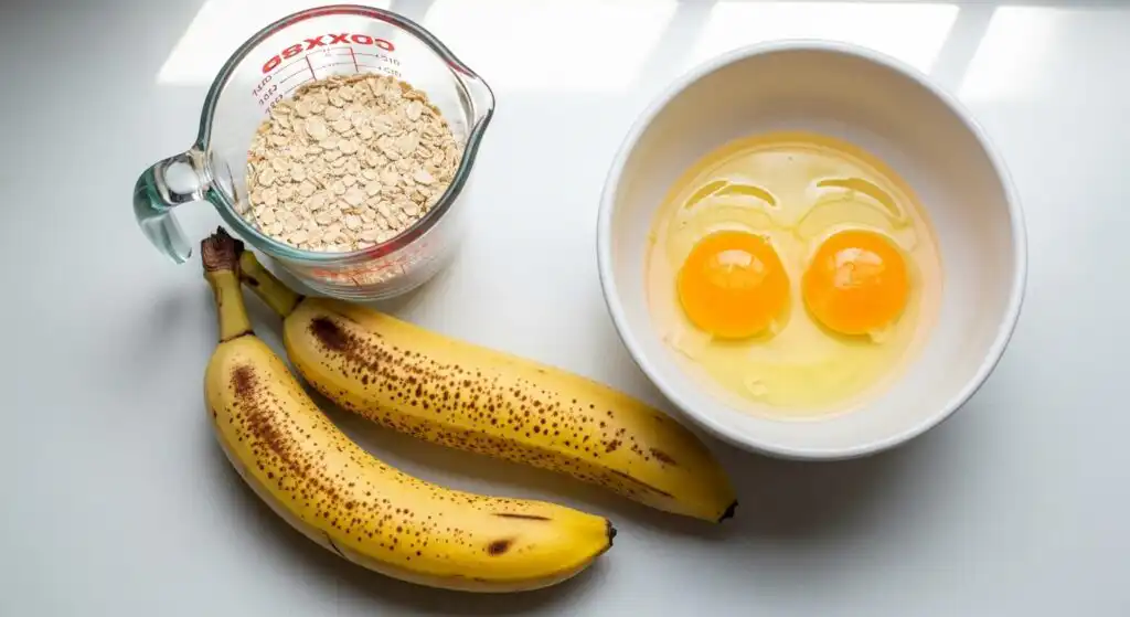 3-Ingredient Banana Pancakes – Easy, Fluffy, No-Fuss Breakfast 6 Ingredients for 3-ingredient banana pancakes on a countertop