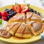 3-Ingredient Banana Pancakes – Easy, Fluffy, No-Fuss Breakfast 9 3-ingredient banana pancakes served with fruit and yogurt