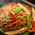 Simple & Delicious Chicken Lo Mein You’ll Love 3 Easy Chicken Lo Mein served in a bowl with vegetables